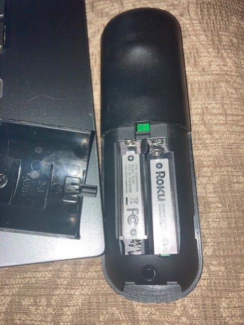 This is the back of the original remote. You will notice the small black pairing button at the bottom of the battery compartment.